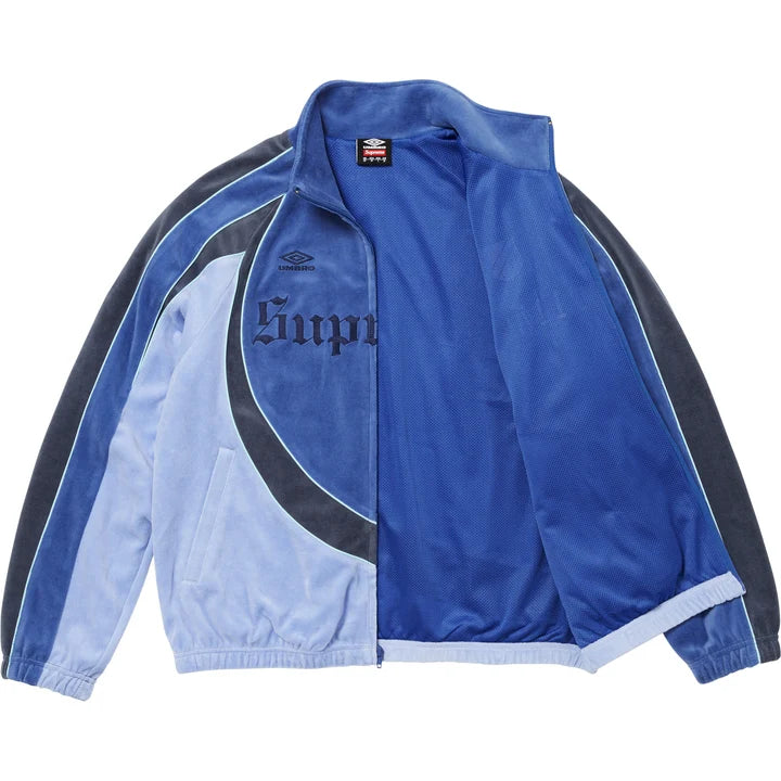 Supreme x Umbro Blue Velour Track Jacket shown part unzipped, revealing the interior lining