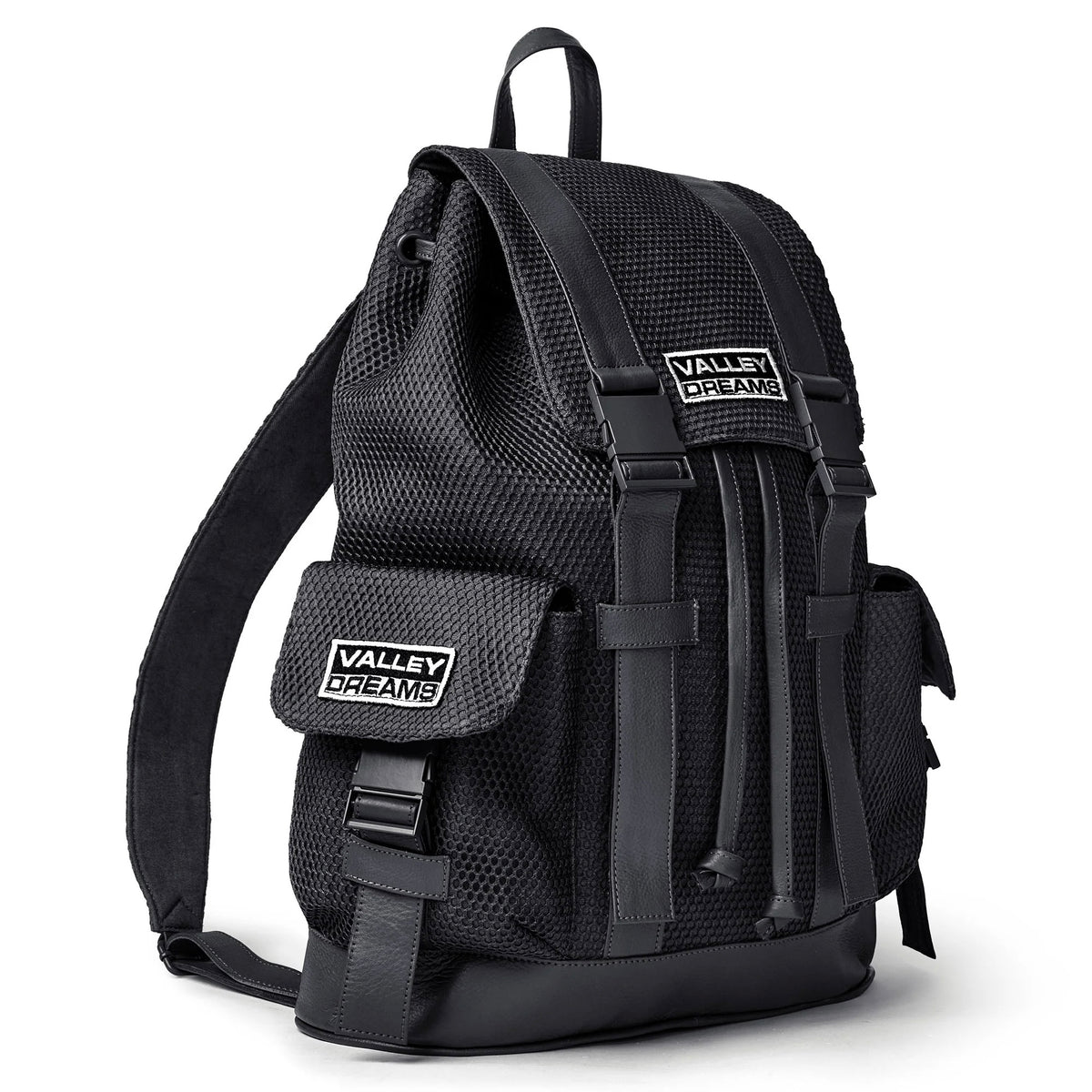 Vale Black Ops Backpack, three-quarter view showing a Valley Dreams patch on the side pocket