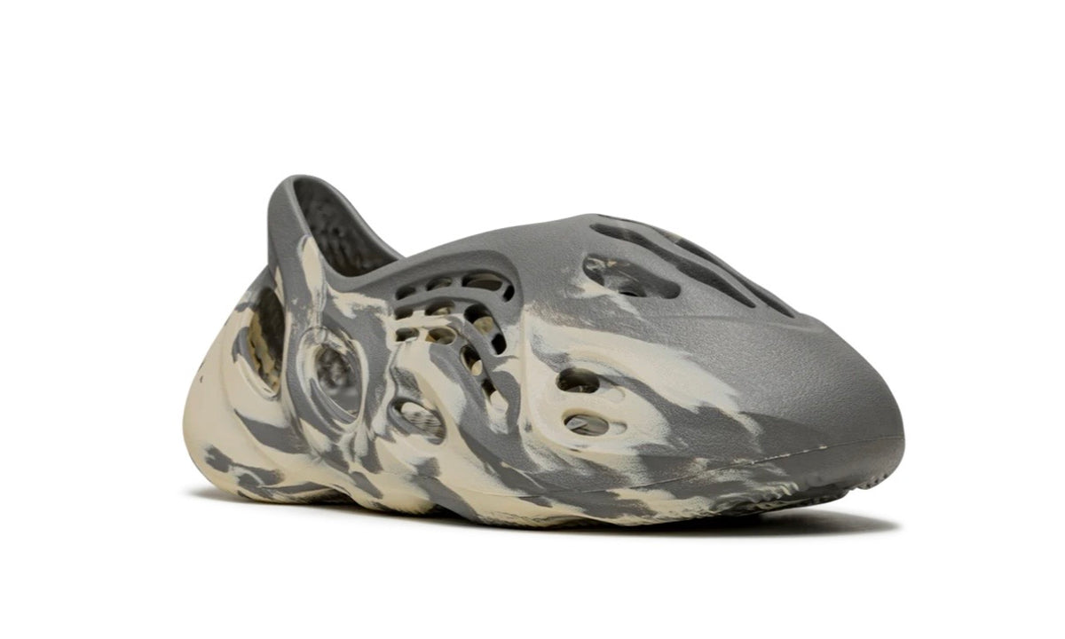 Adidas Yeezy Foam Runner MXT Moon Gray, toe-first three-quarter view of the marbled foam