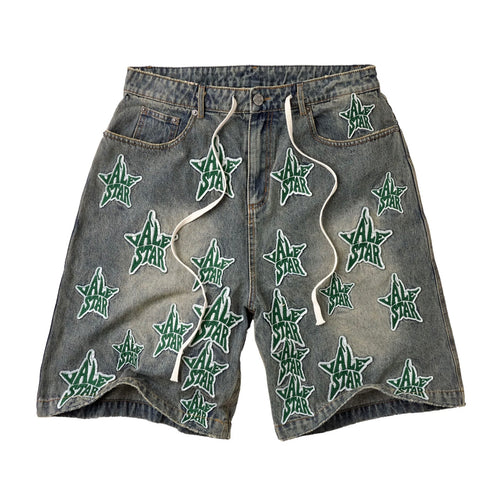 Vale Allstar Jorts, washed grey-green denim jorts with green chenille star patches scattered over both legs and a drawcord