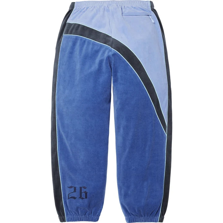 Supreme x Umbro Blue Velour Track Pants back view with the navy 26 numerals on the leg