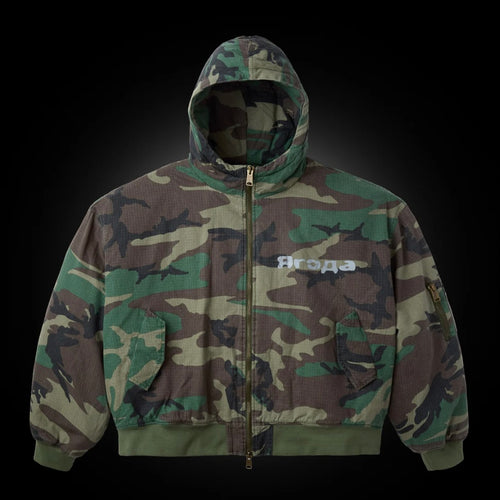 GV Gallery New Castle Jacket, woodland camo hooded jacket with front zip, flap chest pocket and a white Cyrillic Ягода print
