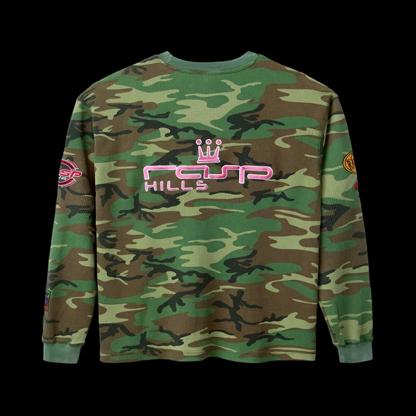 Back of the green camo thermal with pink crowned RASP HILLS logo on the shoulders