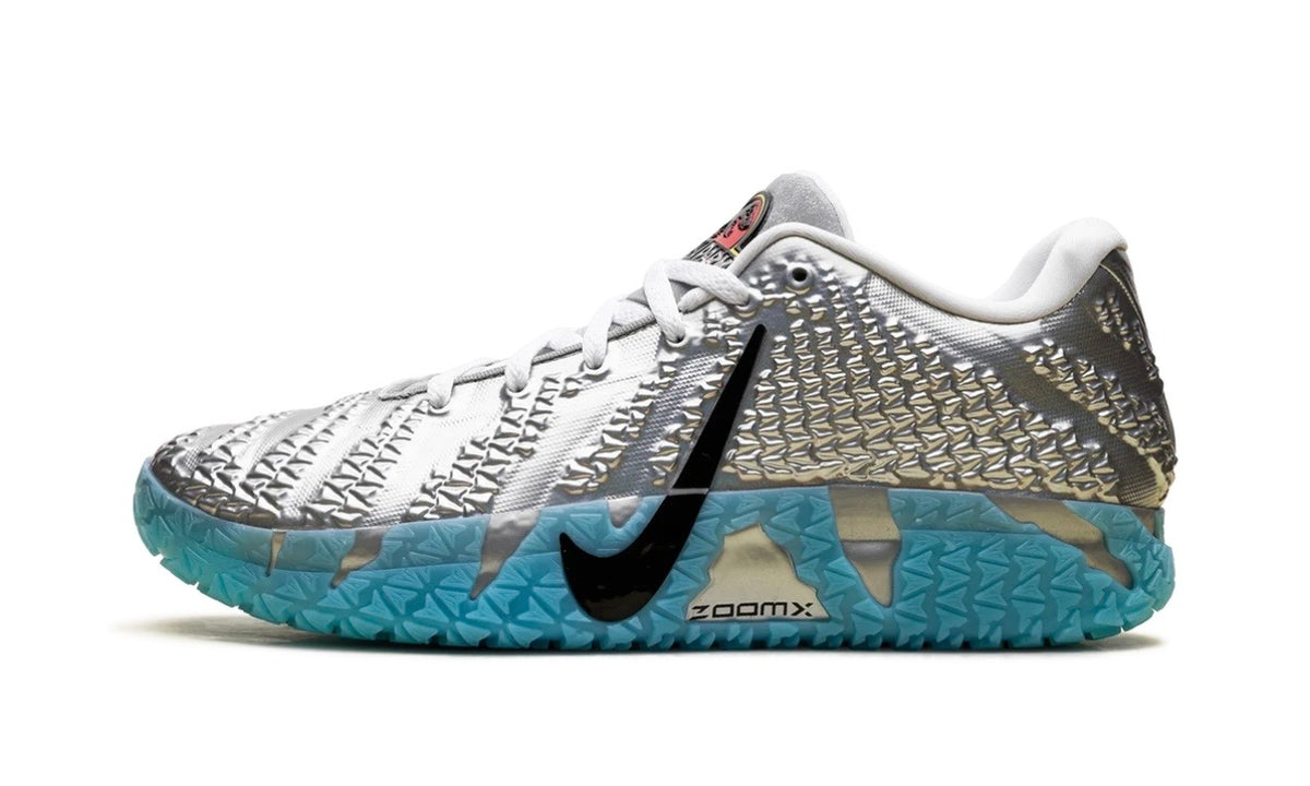 Metallic silver Nike Ja 3 low with black Swoosh and translucent aqua ZoomX outsole