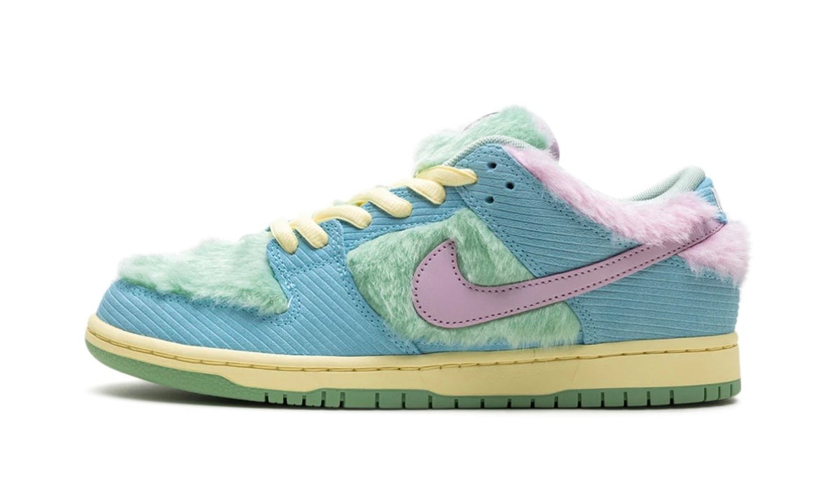 Light blue corduroy Nike SB Dunk Low with mint fur panels and pink Swoosh