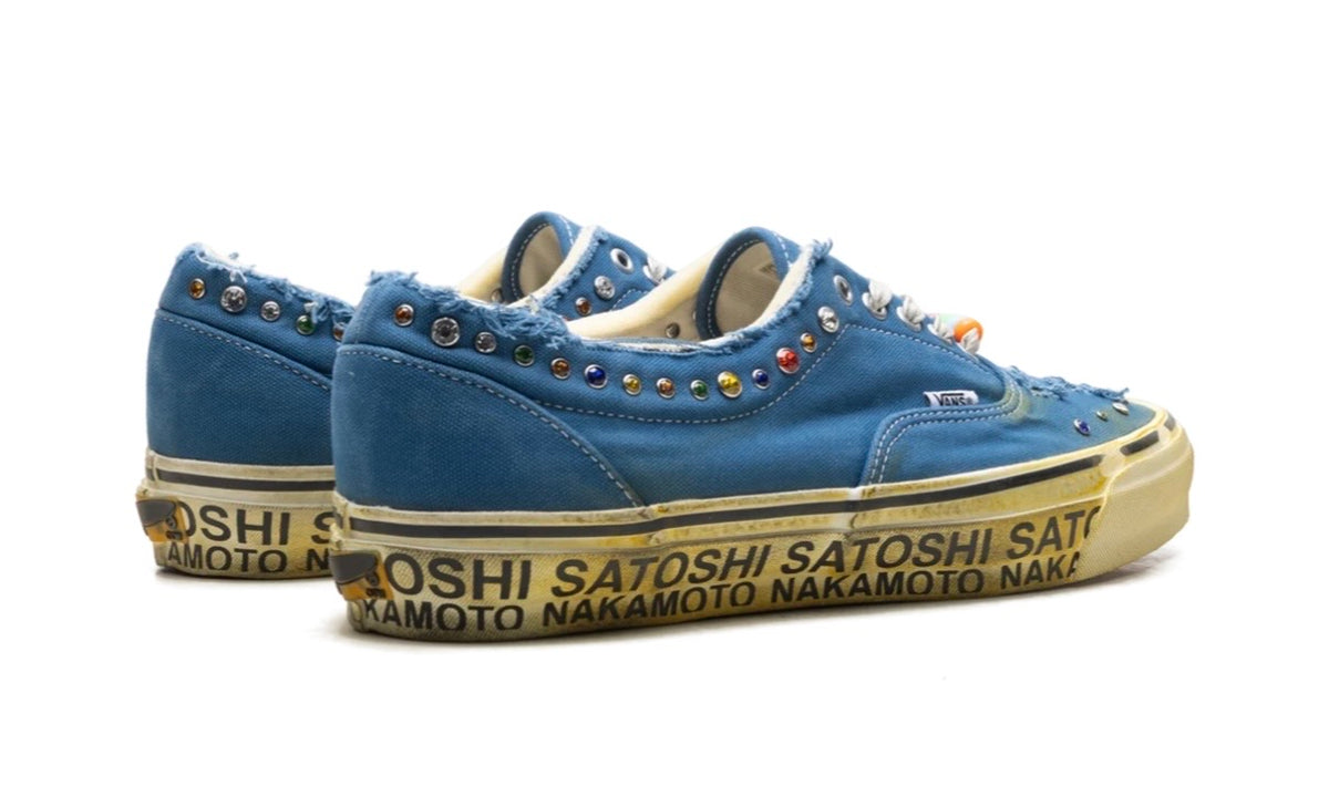 Pair of Vans Era 95 Satoshi Nakamoto Lucky Charm from the rear, printed foxing tape on aged cream soles