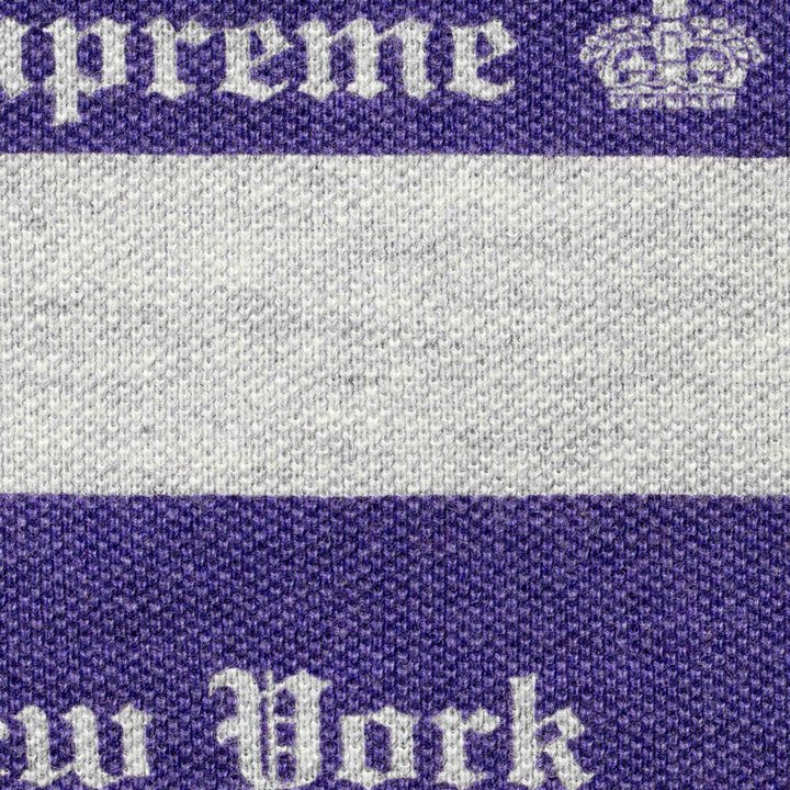 Close-up of the grey and purple jacquard knit with white Supreme crown lettering