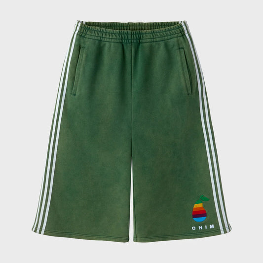 HMDD Pear Tech 3/4 shorts in washed green fleece, front view, with three white stripes down each side seam and a rainbow pear embroidery above the left hem