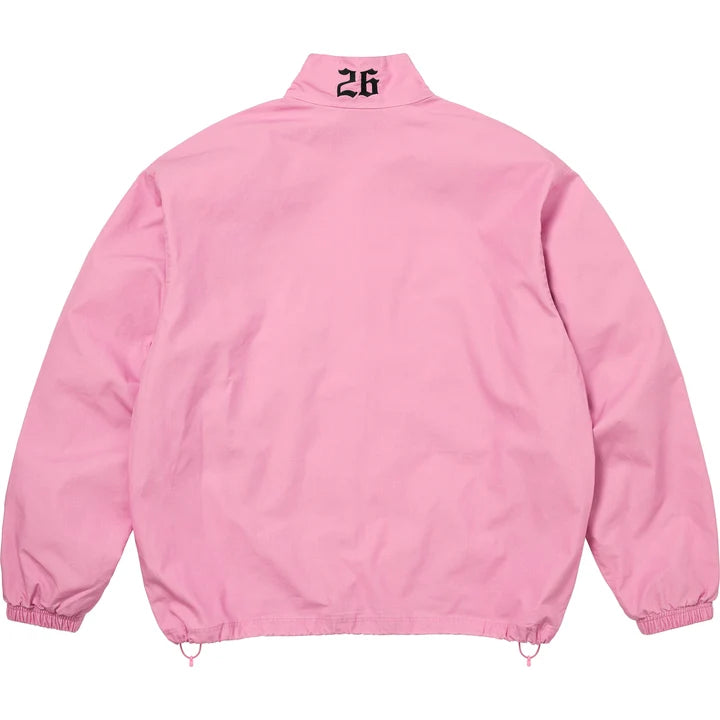 Back of the pink Supreme x Umbro track jacket with 26 embroidered below the collar