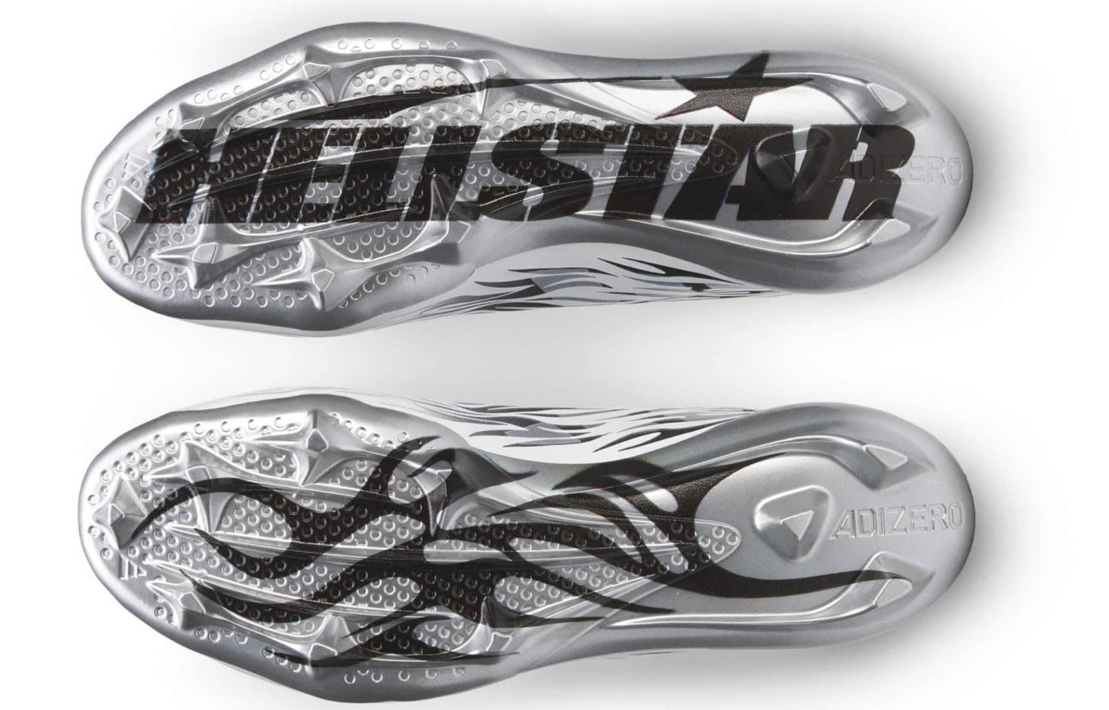 Hellstar Adidas Adizero Electric II White Black Silver, close-up of two silver cleat plates printed with the Hellstar logo and flames