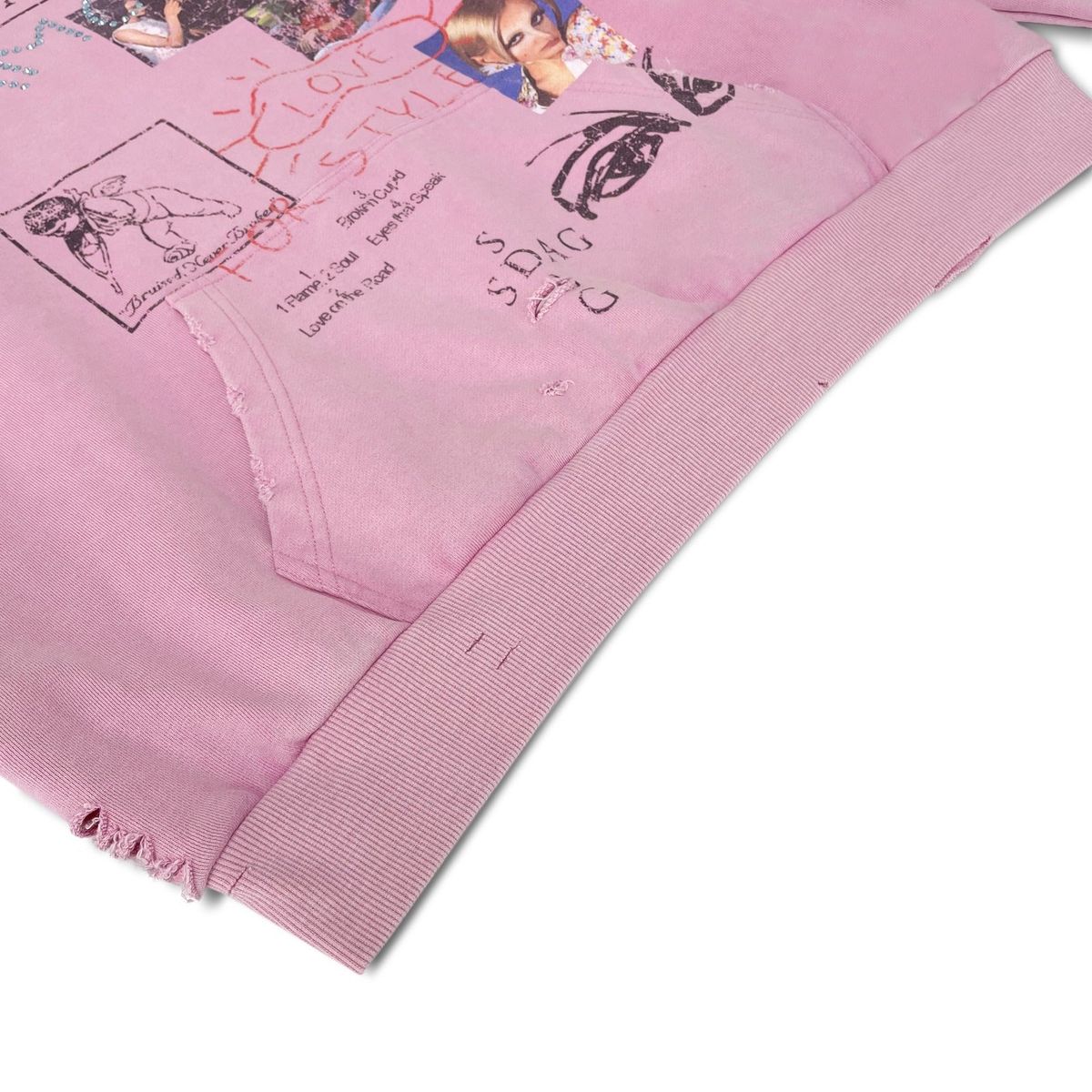 Close-up of the Stile Paradise hoodie kangaroo pocket, ribbed hem and distressing