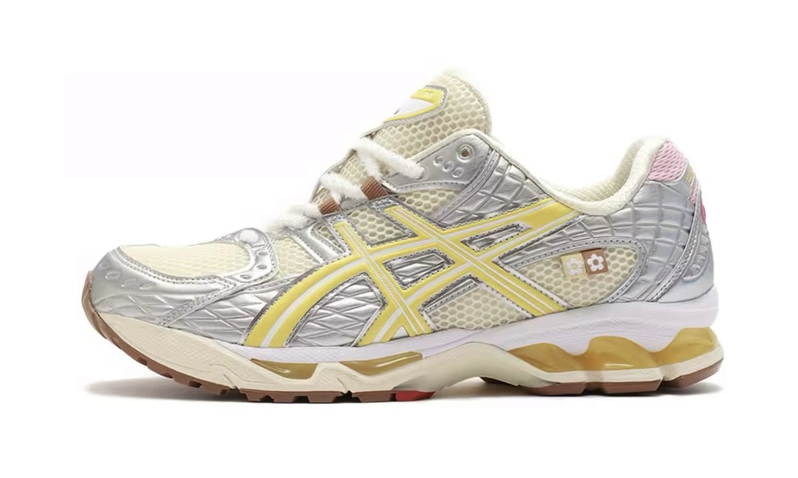Asics Gel-Nimbus 10.1 Vandy The Pink Atmos Banana Split, side view of a cream and silver upper with pale yellow stripes and pink accents