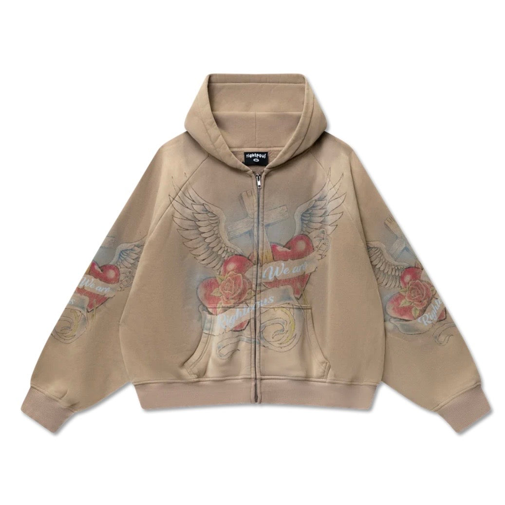Washed tan zip hoodie printed with red and grey winged sacred heart graphics