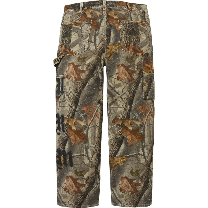 Supreme Realtree Camo Double Knee Painter Pants back view with blackletter leather lettering down the leg