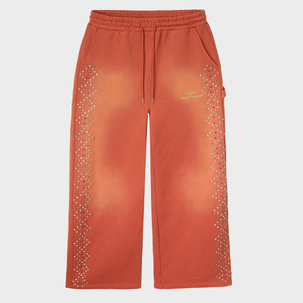 HMDD Orange Crystal Sweatpants, sun-faded burnt orange sweatpants with drawstring waist and rhinestones scattered down both legs