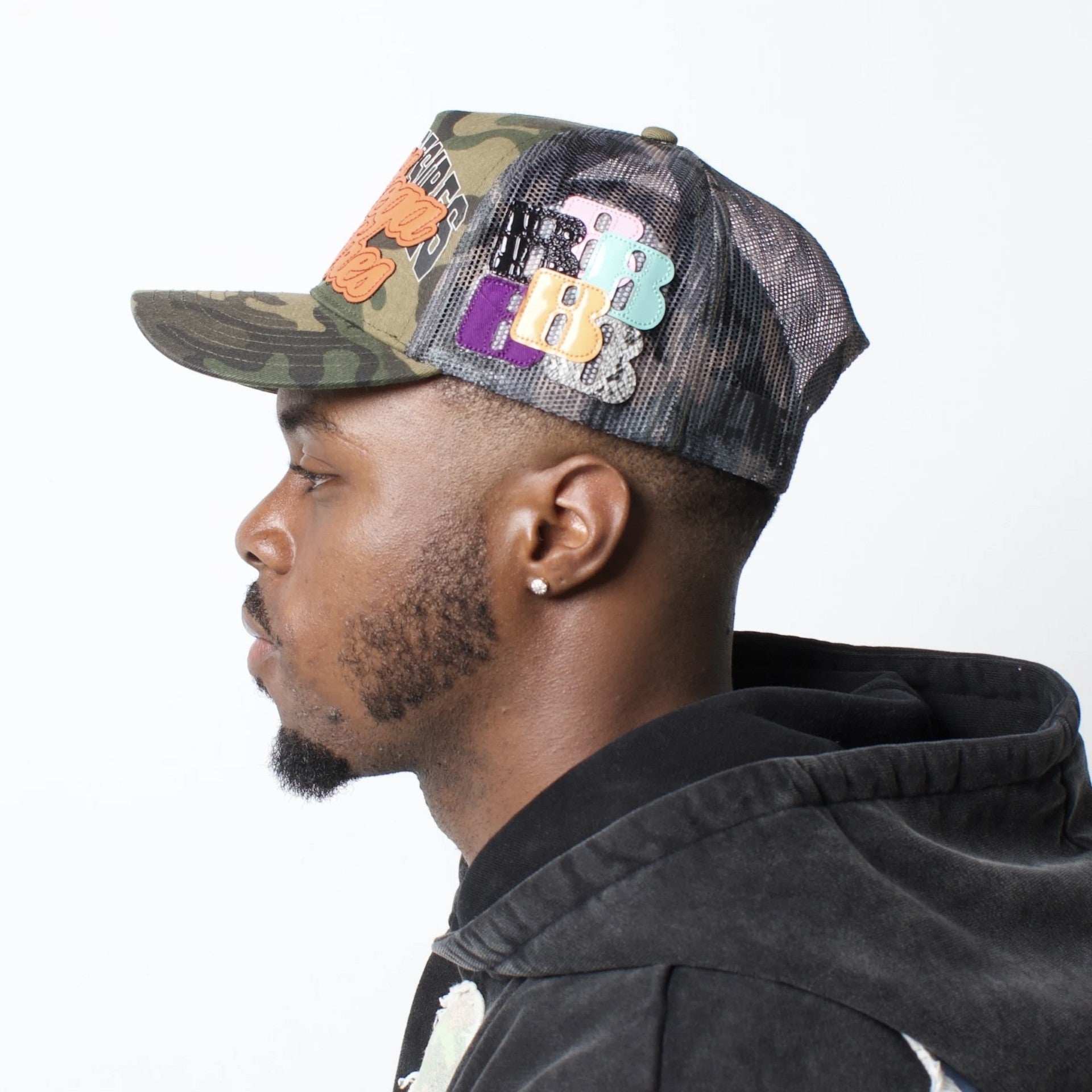 Bottega Desires Camo Trucker Hat On Body Left