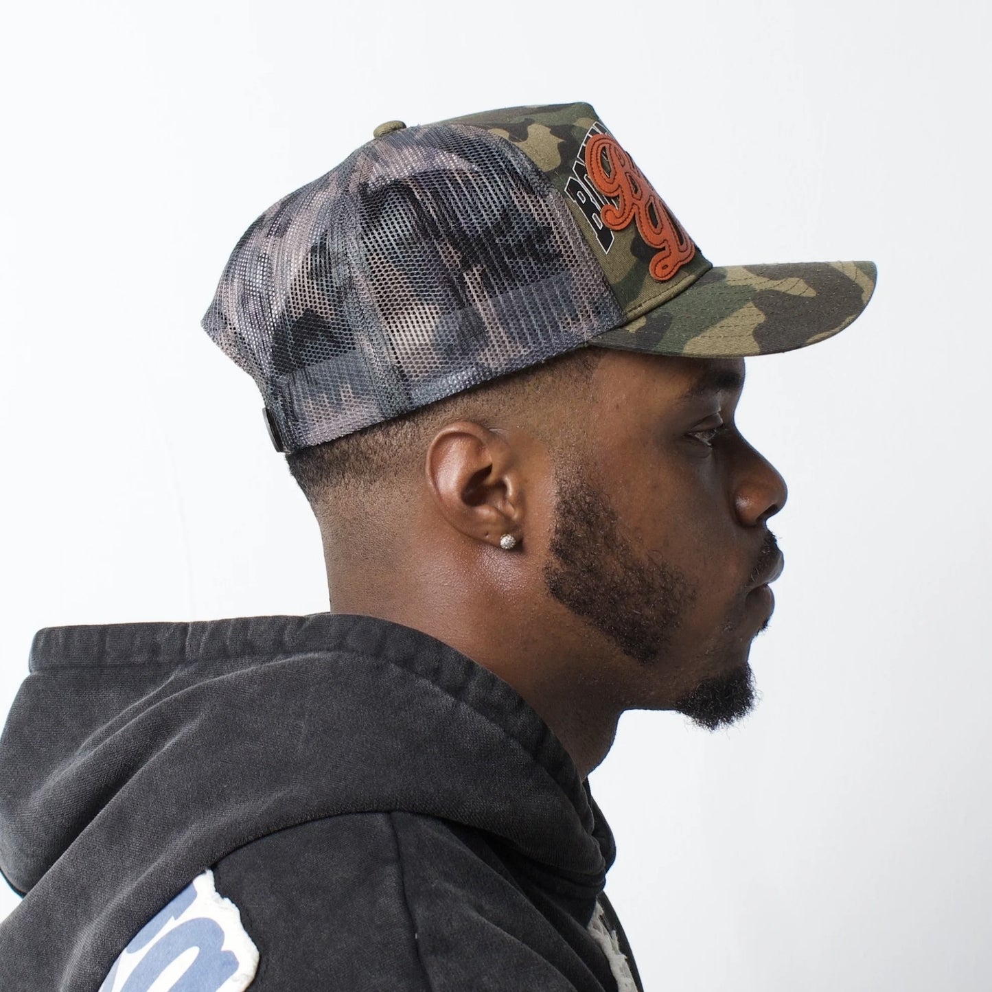 Bottega Desires Camo Trucker Hat On Body Right