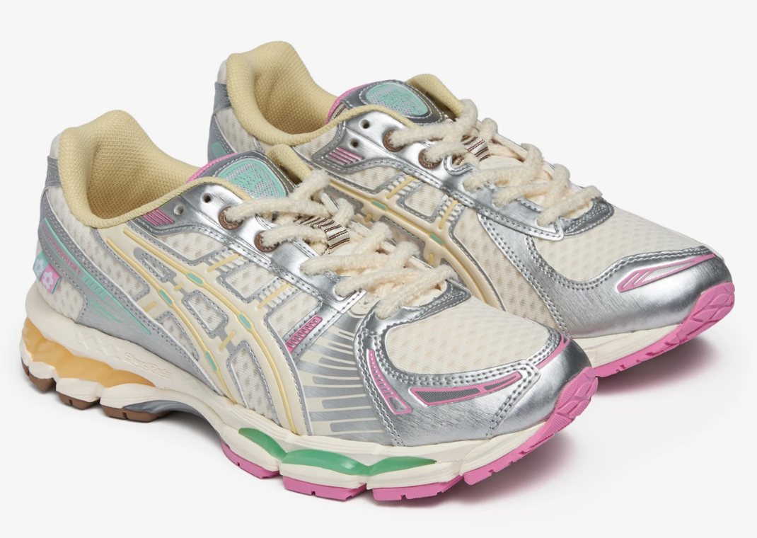 Vandy The Pink Asics Gel-Kayano 12.1 Vanilla, angled view of the pair, cream mesh and silver overlays over pink, mint and yellow soles