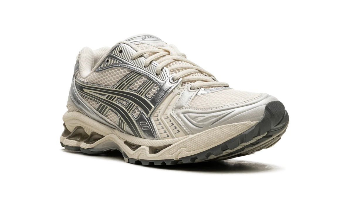 Asics Gel-Kayano 14 Birch Dark Pewter, medial three-quarter view with dark pewter Asics stripes