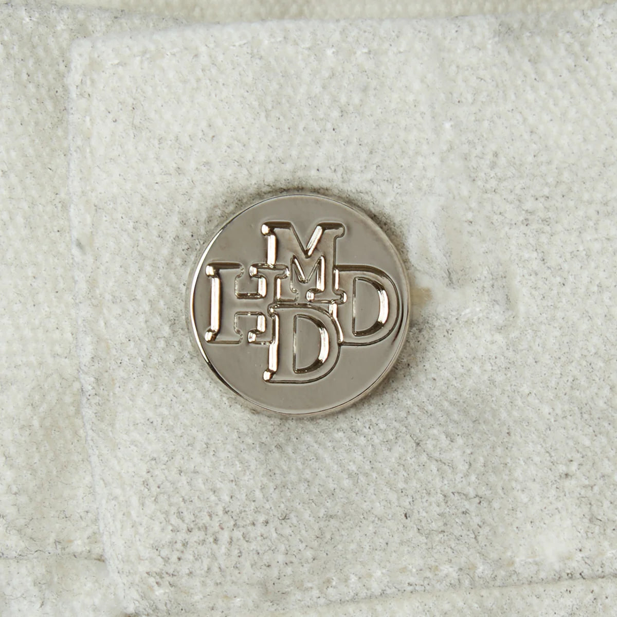 HMDD Big Ed Work Pants, close-up of the silver HMDD monogram button