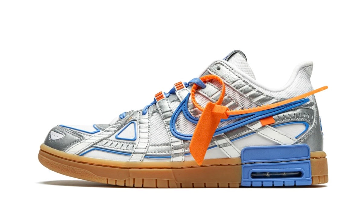 Off-White x Nike Air Rubber Dunk UNC, lateral profile showing the blue Air heel unit