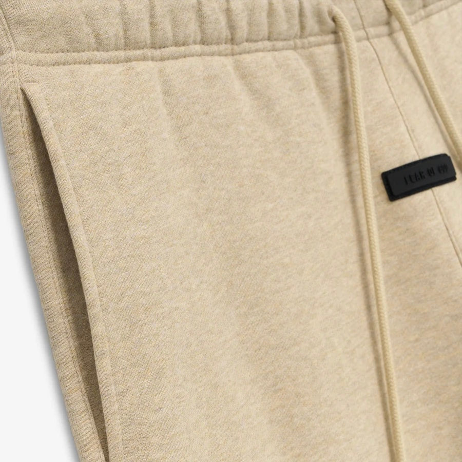 Fear of God Essentials Gold Heather Shorts Close View