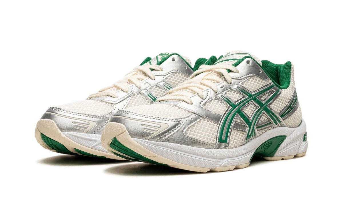 Asics Gel-1130 Cream Kale, pair shown from the front with cream laces and silver toe overlays