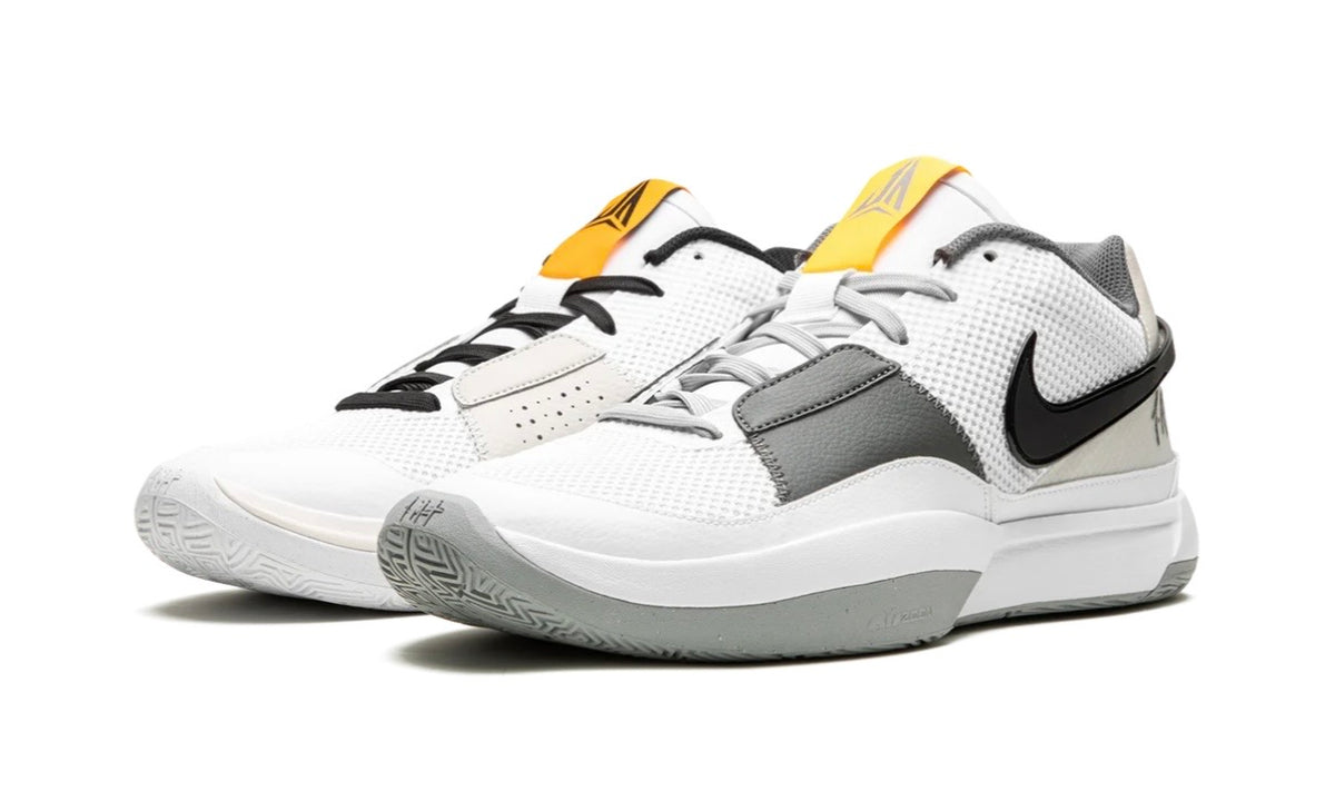Nike Ja 1 Light Smoke Grey, pair shown from the front with white mesh, grey overlays and black laces