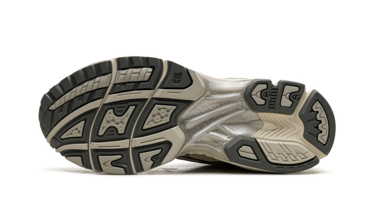 Asics Gel-Kayano 14 Birch Dark Pewter outsole in grey and cream rubber