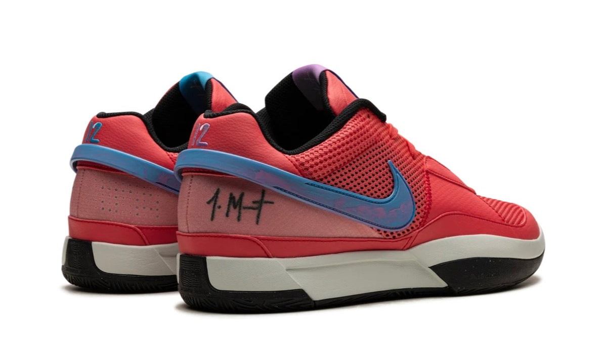 Nike Ja 1 Fuel, rear three-quarter view of the pair showing the pink-to-purple heel panel