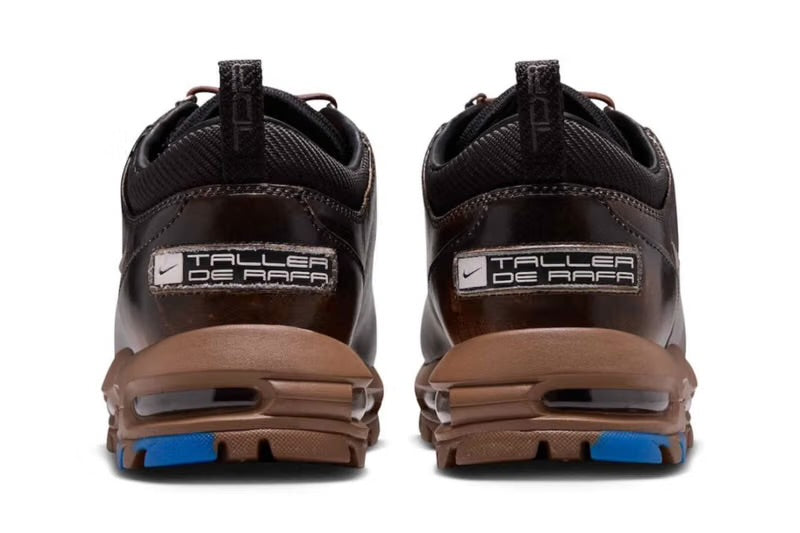 Heel view of brown Nike Air Max Goadome pair with white TALLER DE RAFA heel patches