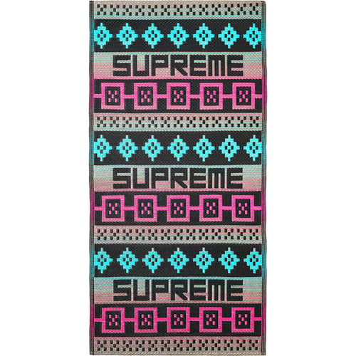 Supreme Grey Sosenap Plastic Mat, woven plastic mat laid flat, silver ground with black SUPREME bands and pink and cyan borders