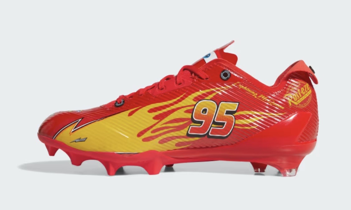 Adidas Pixar Cars Adizero Electric II cleats medial profile — red upper with yellow flames, 95 numerals, toe stud