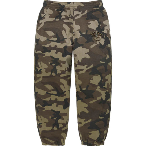 Supreme True Religion Brown Camo Sweatpants, brown and olive camo sweatpants with a small studded horseshoe emblem on the hip