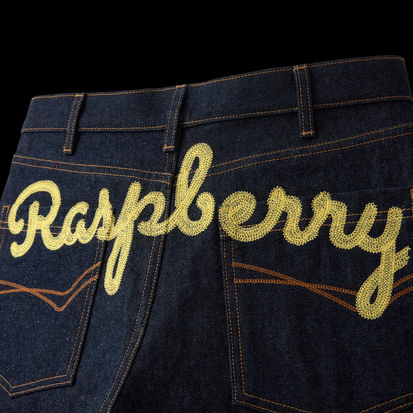 GV Gallery Belt Jorts close-up of the chain-stitch Raspberry script over the back pockets