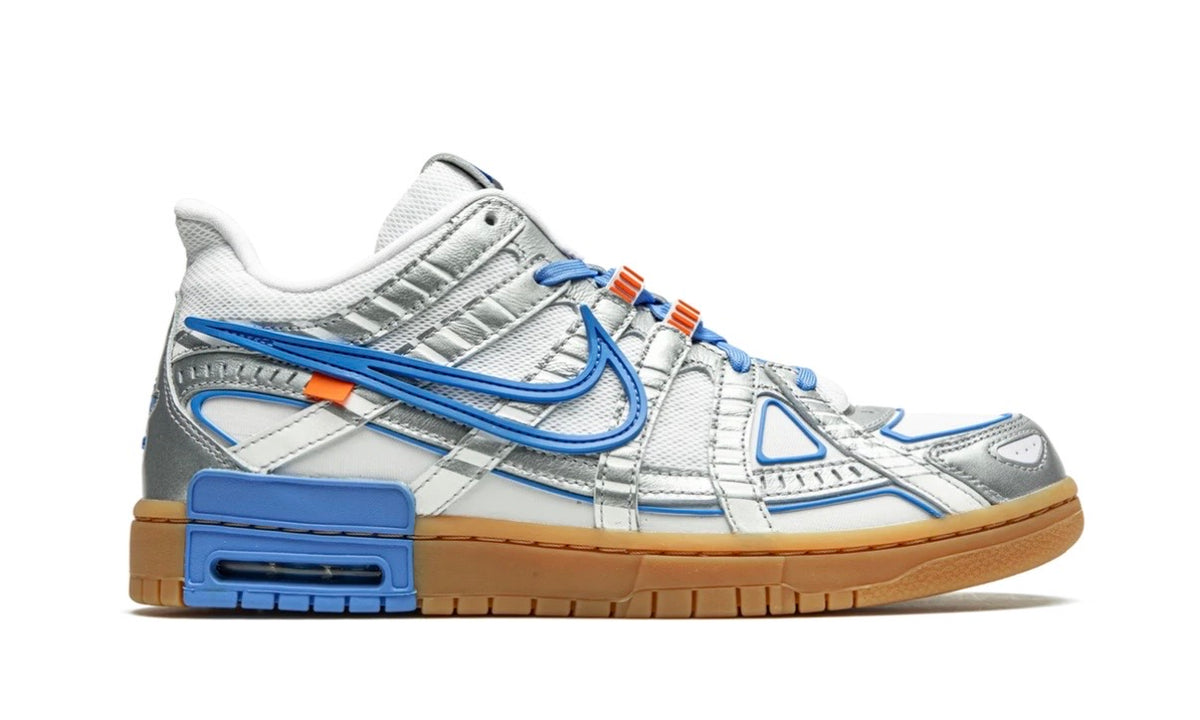 Off-White x Nike Air Rubber Dunk UNC, medial side profile with blue heel block