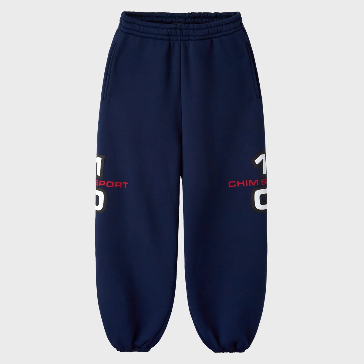 HMDD navy sweatpants with red and white 10 CHIM SPORT prints on the outer legs and elastic cuffs, front view