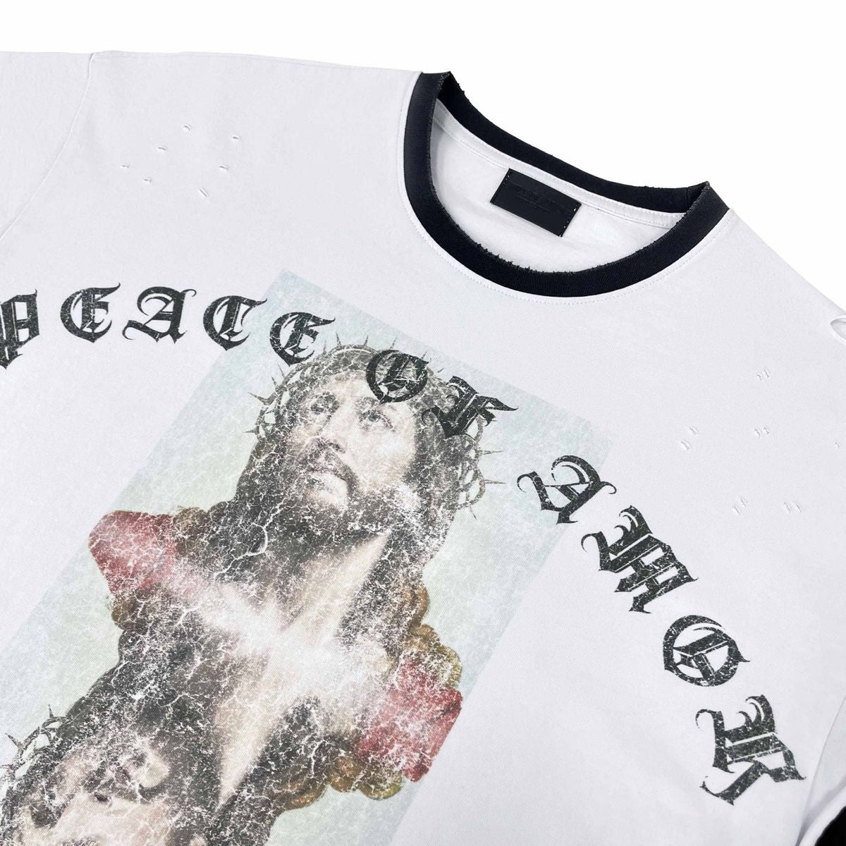 Stile De Amor White Peace of Amor T-Shirt, close-up of the front print, gothic PEACE OF AMOR letters around the image