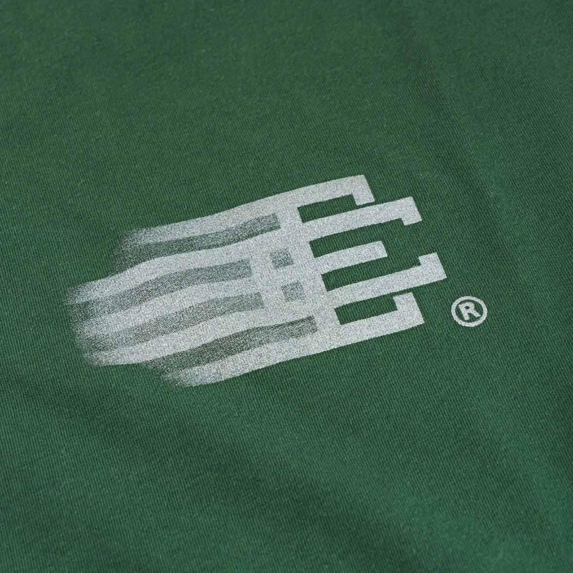 Eric Emanuel Dark Green Motion Logo T-Shirt Close