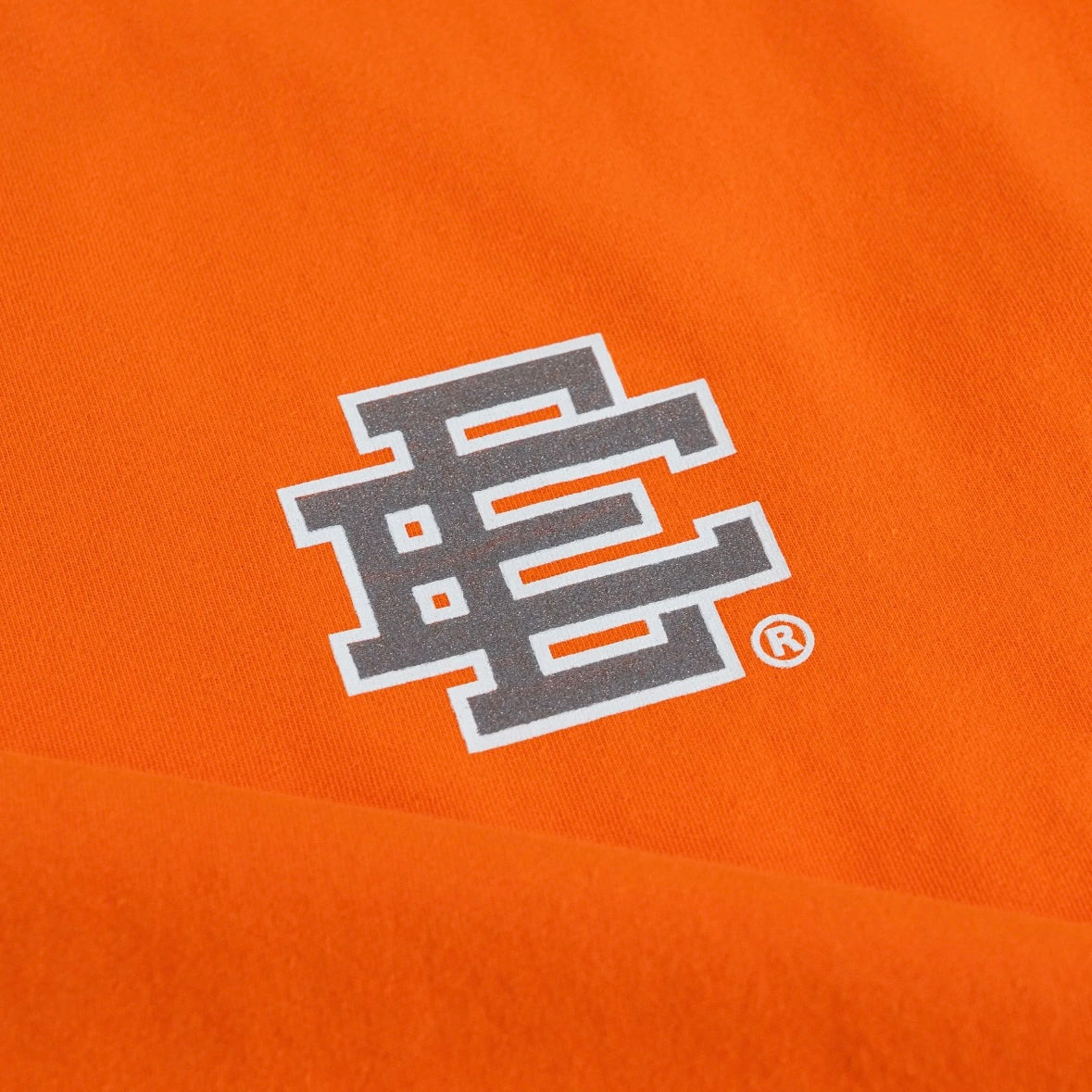 Eric Emanuel Orange T-Shirt Logo