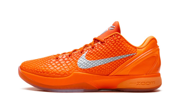 Nike Kobe 6 Total Orange, side view of an all-orange scaled low-top with metallic silver Swoosh and Zoom midsole