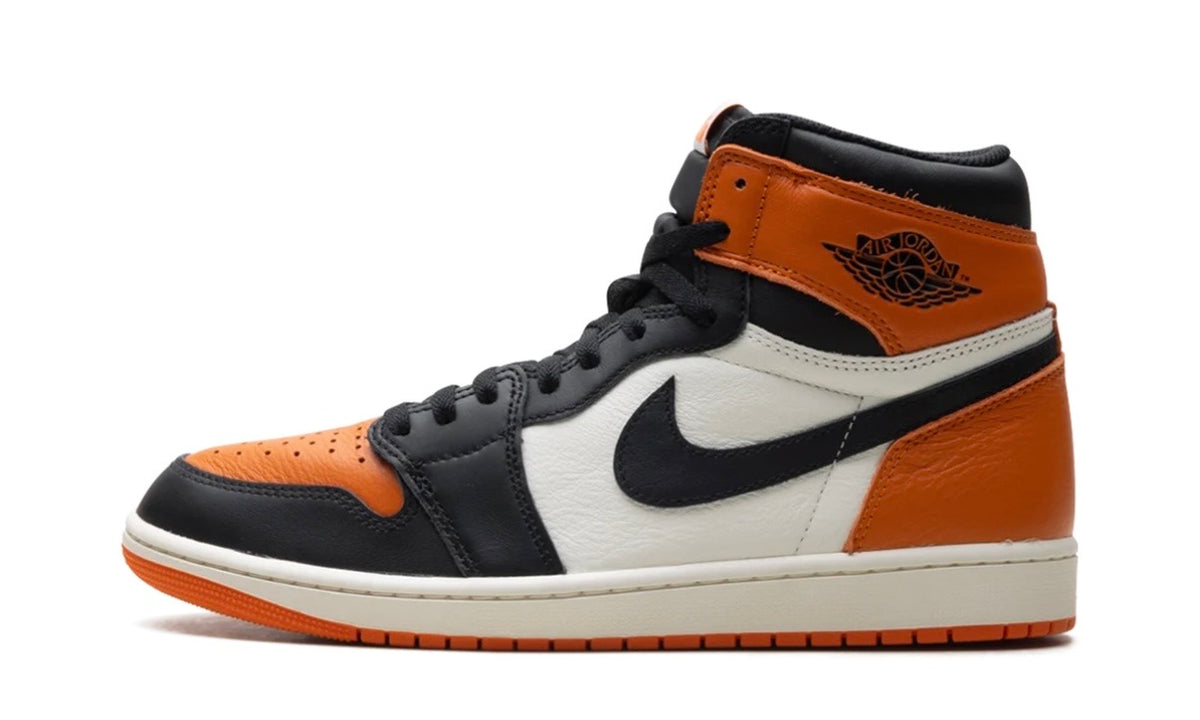 Air Jordan 1 High Shattered Backboard with orange toe and heel, black overlays and white side panels, lateral side profile