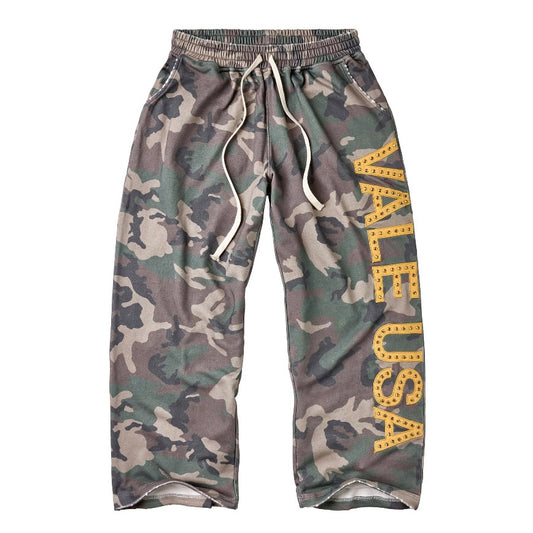 Vale Camo Sweatpants front view in woodland camo with gold Vale USA lettering down the leg