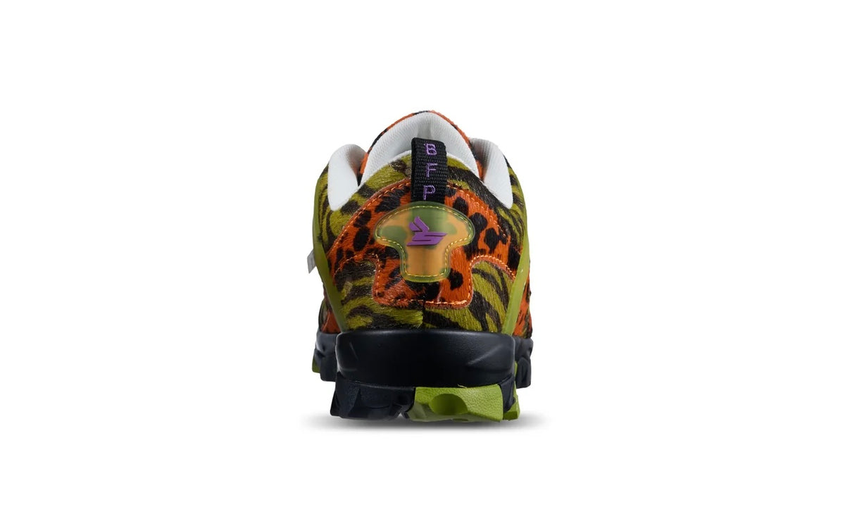 Sicko x xVessel Tiger Orange hiking shoe from the heel, animal print upper and lime accents