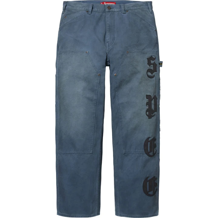 Supreme Leather Applique Double Knee Painter Pants front view in washed blue canvas with double knee panels