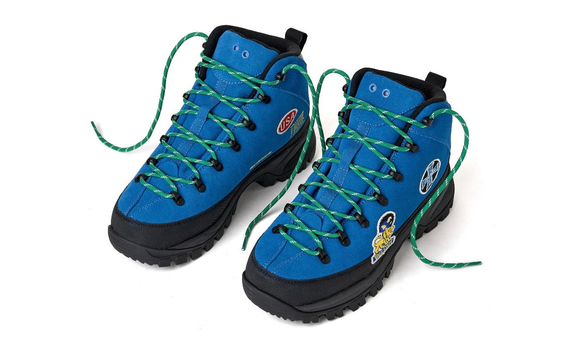 Vale Oasis Hikers pair at a front three-quarter angle — blue suede high-top boots with green laces trailing