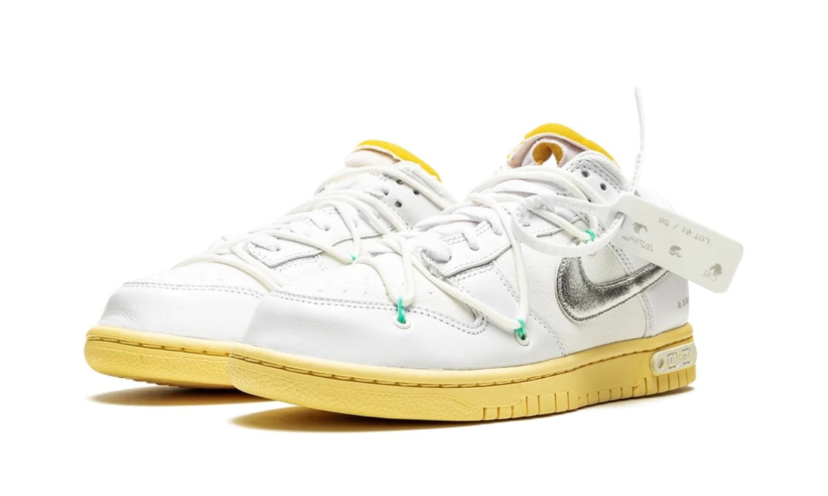 Off-White x Nike Dunk Low Lot 1, front three-quarter view with zip tie and green lace loops
