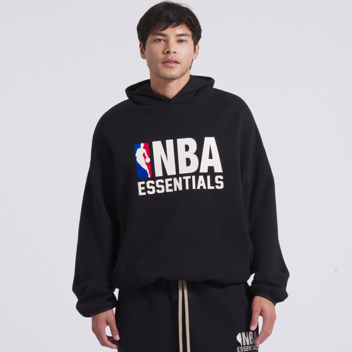 Fear of God Essentials NBA Black Hoodie On Body Front