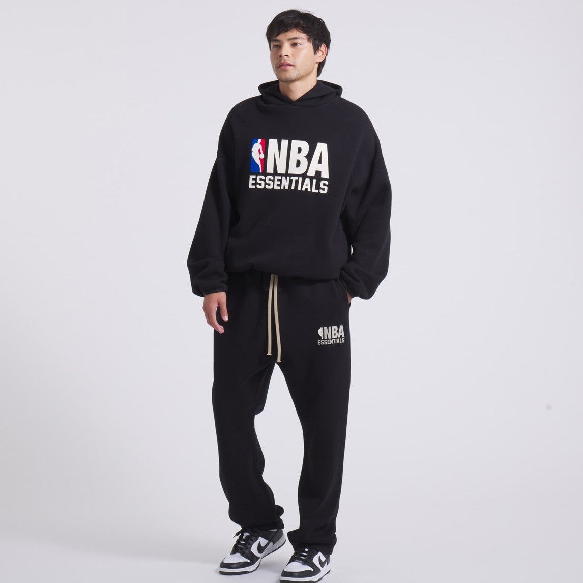 Fear of God Essentials NBA Black Hoodie On Body 3