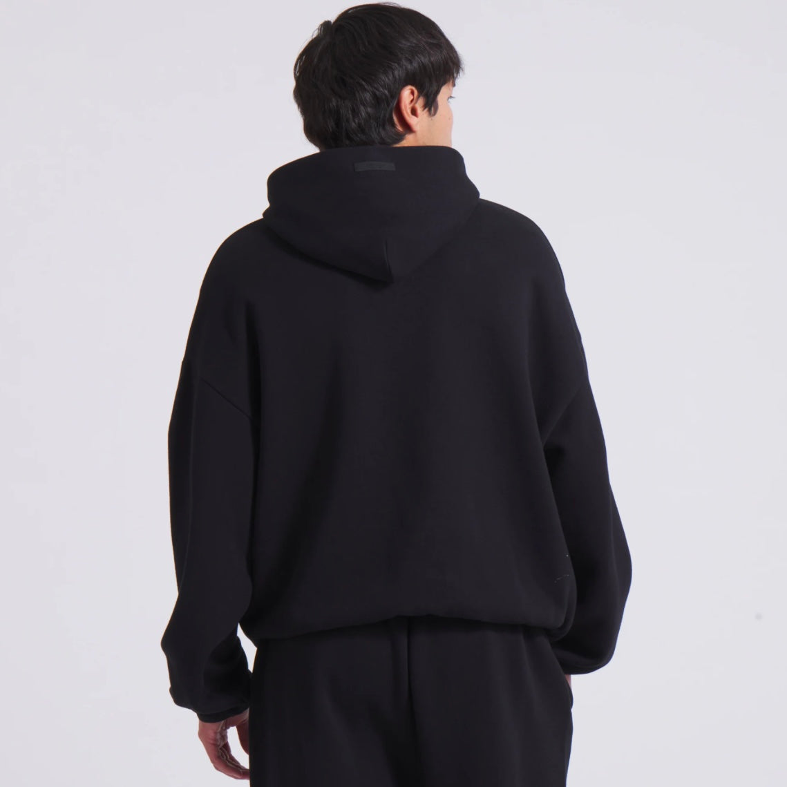 Fear of God Essentials NBA Black Hoodie On Body Back